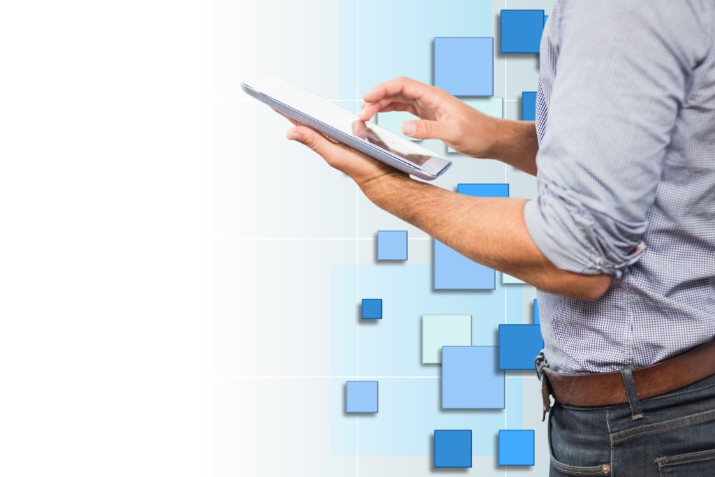 Transformación digital businessman using his tablet with background blue tones